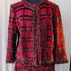 Red Boucle 2 piece St John knit suit size 10 with box pleat skirt.